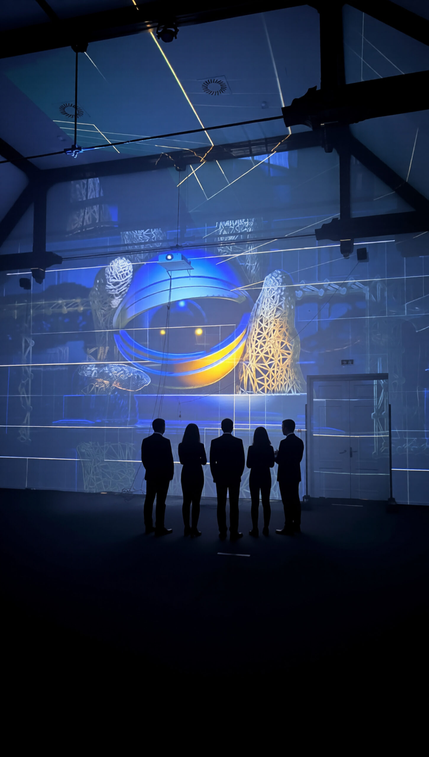 A group of people stands within a immersive 360° projection of an eye.
